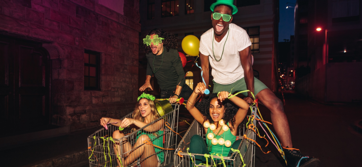 Group of friends celebrating St. Patrick’s Day in Detroit dressed in green